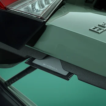 Ice scraper with tyre tread depth gauge